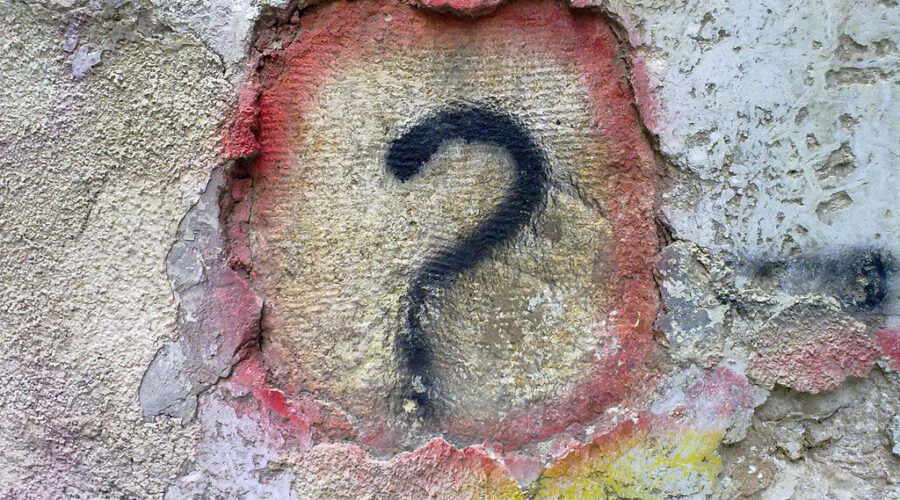 Question mark in colours on wall