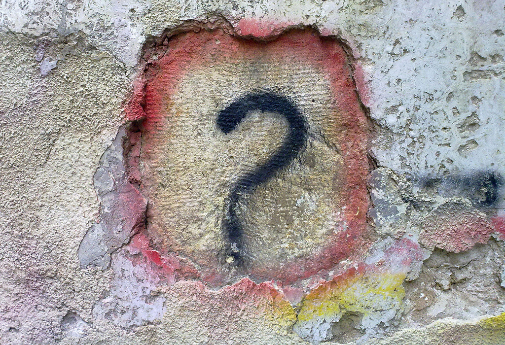 Question mark in colours on wall