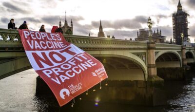 Peoples vaccine banner drop