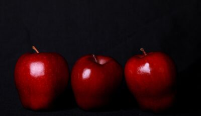 Three red apples