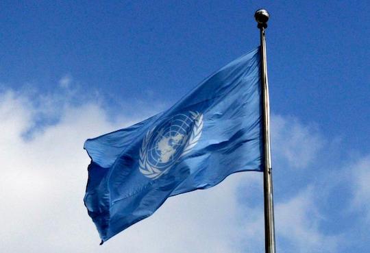United nations flag with sky
