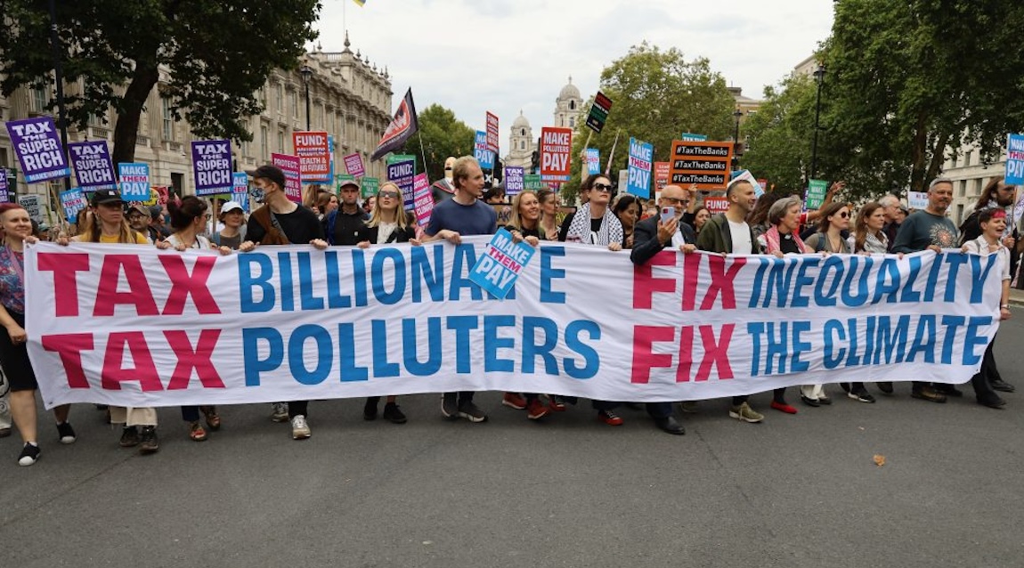 Tax Billionaires and polluters fix inequality and the climate: Image credit: Manchester FoE, Blackwater Valley FoE